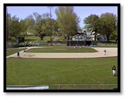 A baseball field with people playing baseball